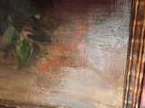 a picture of a painting on a table with a red marker on it