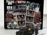 toys are displayed in front of a black box with pictures of soldiers