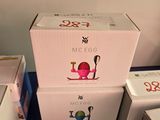 Plusieurs boîtes de jeux Nintendo Wii sont empilées les unes sur les autres