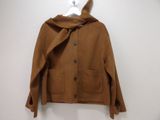 brown wool jacket with hood on hanger on white wall