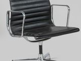 an image of a black leather office chair on a chrome steel base