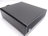 an image of a black desktop computer sitting on top of a white surface