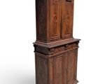 an image of a tall wooden cabinet on a white background