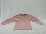 pink long sleeved top on a white background