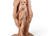 an image of a statue of a woman holding a child