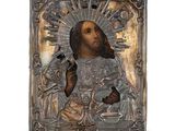 une image représentant une plaque métallique sur laquelle figure Jésus