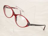 a pair of glasses that are sitting in a clear box