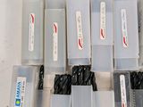 a lot of different types of drill bits in a box
