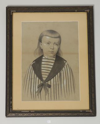 portrait of a young man in a sailor ' s outfit in a black and white photo