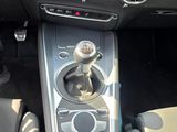 a picture of a car dashboard with the center console in the car