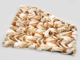 the blanket is made of faux and has a brown and white pattern