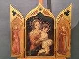 an image of a painting of a woman holding a child in her arms