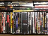 a lot of dvds in a box on the table