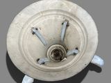 a close up of a white plate with blue handles