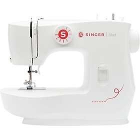 Une machine à coudre Singer blanche sur fond blanc