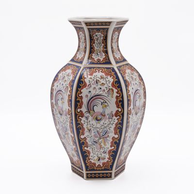 a vase with a design on it on a white background