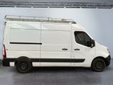 a white van that is parked inside of a building