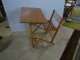 a small table and two chairs in a room