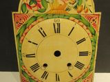 a clock that is sitting on a table in a room