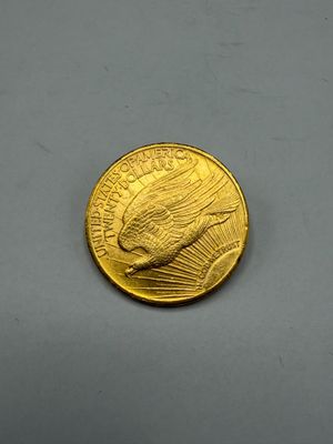 Une Pièce or de 20 Dollars. 33.