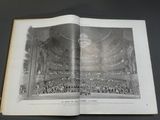 an open book with an image of a large crowd in a large auditorium