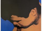 a close up of a picture of a person with a blue background