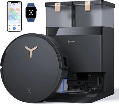 un gros plan d'une machine à café avec un téléphone à côté
