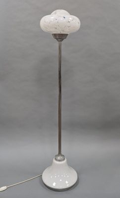an image of a white table lamp with a glass shade on it