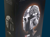 a box with a lego model of a star wars helmet on it