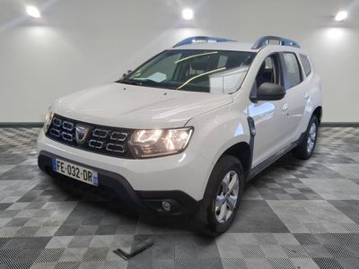 a picture of a white dacia parked on a checkered floor