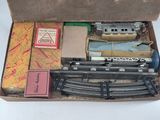 a box with a train set in it on a table