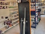 shelves in a store with various items for sale on them