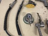 a lot of tools that are sitting on a table