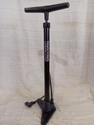 a close up of a black floor pump on a white background