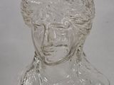 an image of a clear glass bust with a crown on top of it