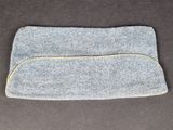 a close up of a gray purse with a zipper on it