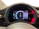 the dashboard of a car with a digital display in the center