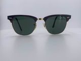 a close up of a pair of sunglasses on a table