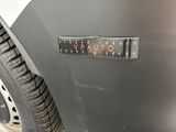 a close up of a sticker on a car ' s front bumper