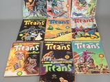 a bunch of comics sitting on top of a table next to each other