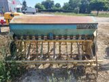a tractor that is sitting in the dirt