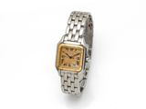 une montre-bracelet en argent et en or, ornée de chiffres romains