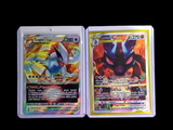 two pokemon cards are sitting side by side on a black background
