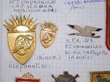 a lot of different badges on a piece of paper