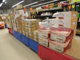many boxes of baby products on the shelves in the store