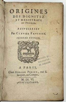 an old book with a black and white image of a seal on it