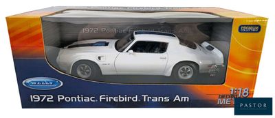 the box is open to show the white car in it ' s packaging