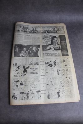 newspapers are laying on a table with a black and white photo of a newspaper