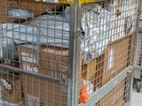 a cart full of boxes and boxes sitting on the floor