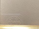 an image of a close up of a metal object on a table